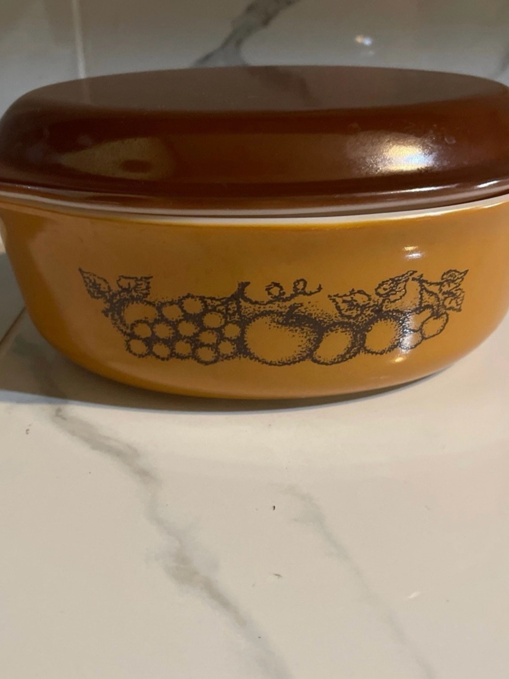 Pyrex Amber and Brown Covered Casserole with Fruit Motif